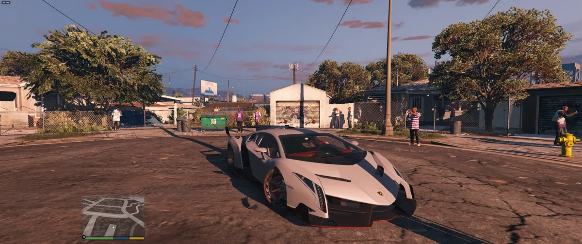 A Lamborghini Veneno add-on car in Grove Street at sunset, fullscreen on an ultrawide display with a Mac mini M4